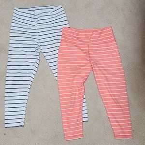 Pair of Kiava stripped leggings size medium